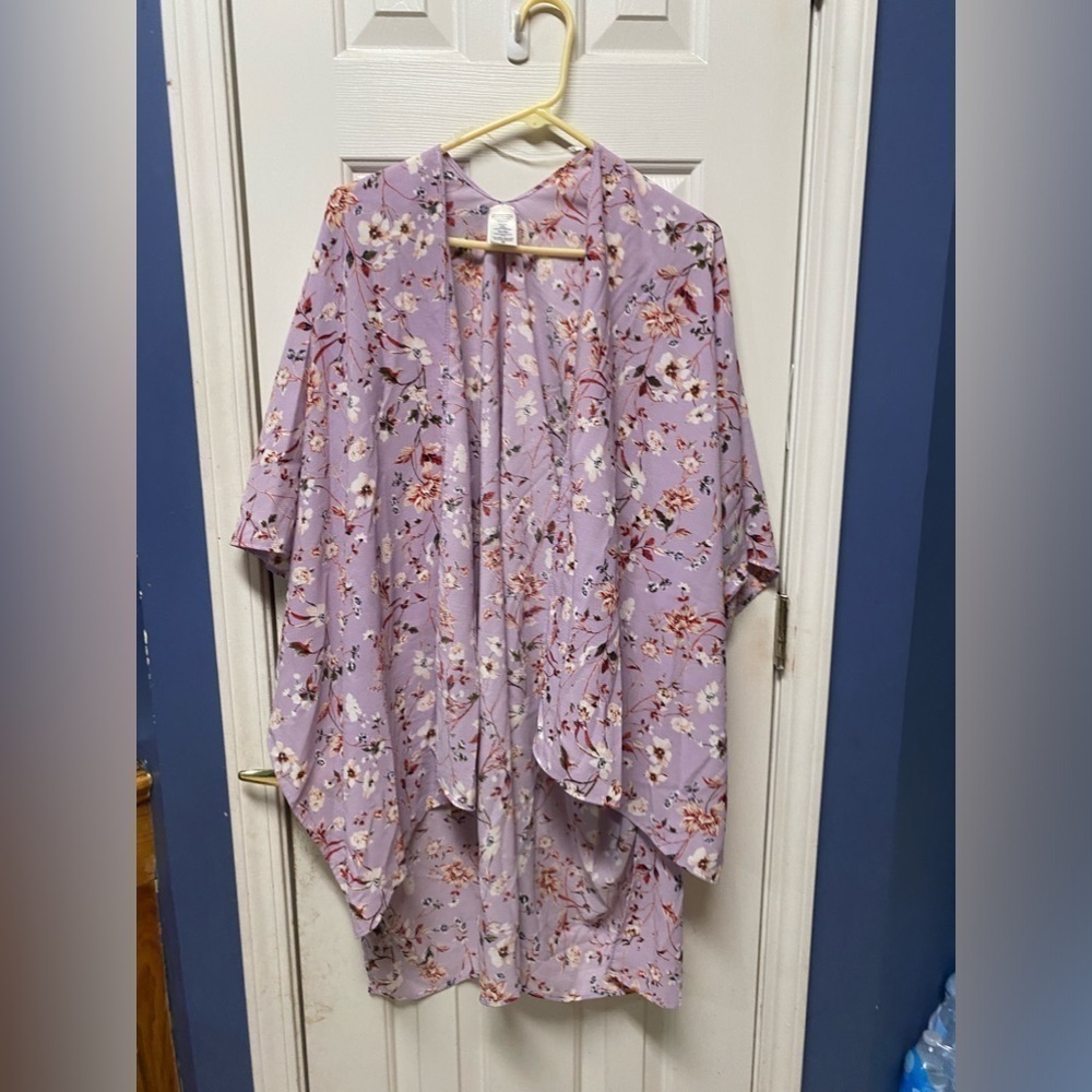 Purple Floral one size fit most Kimono
Polyester blend, light weight